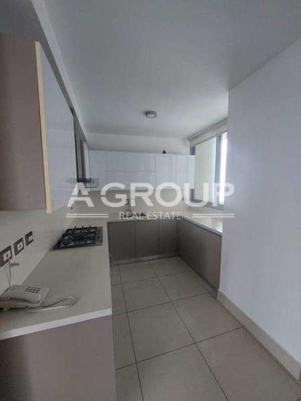 Contemporary kitchen with granite countertops in PH Bali Costa del Este