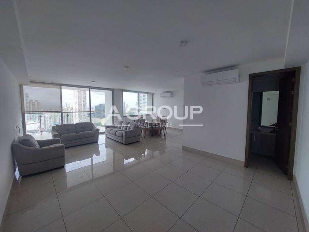 Open living dining room with ocean views at PH Bali Costa del Este