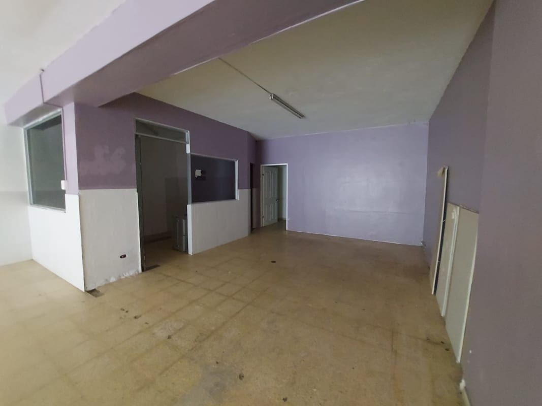 Spacious empty interior with glass entrance ready for retail Via España Panama City