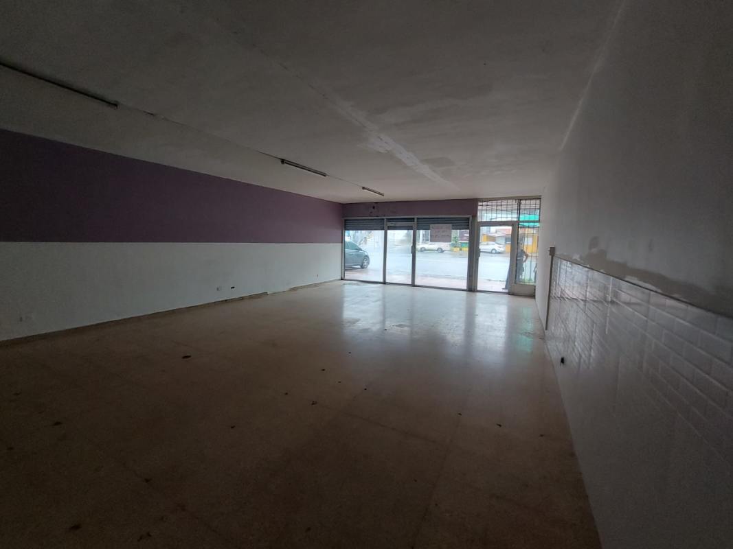 Empty commercial unit with lavender white walls partition area Via España Panama City