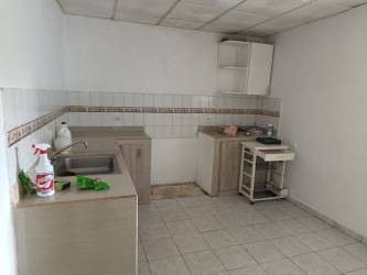 Simple bedroom with closet area and windows with security bars La Chorrera house