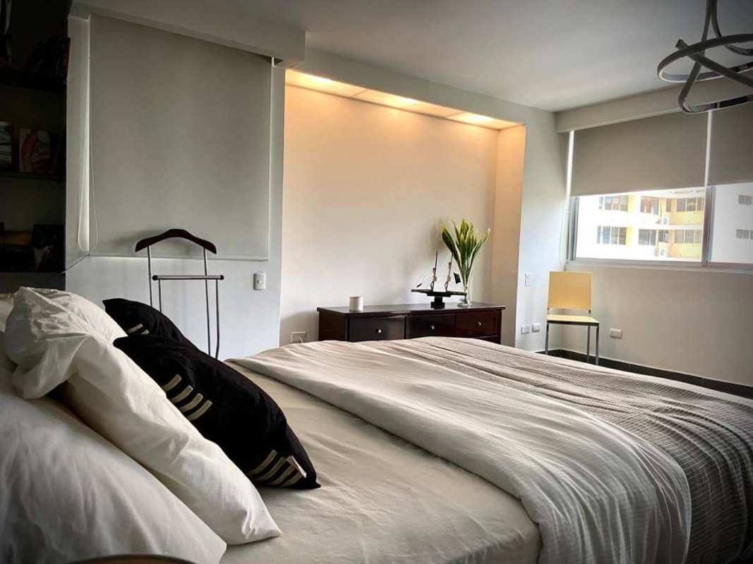 Furnished master bedroom with built-in closet and ocean view at PH Pacific Hills Punta Paitilla Panama