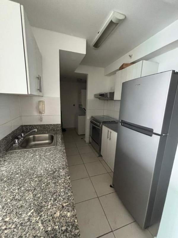 Second bedroom with window and built-in wardrobe in PH Parque Lefevre Panama City