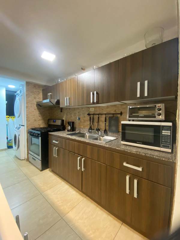 Bright open living dining room with tile floors and AC in PH Terrazas del Rey Condado del Rey