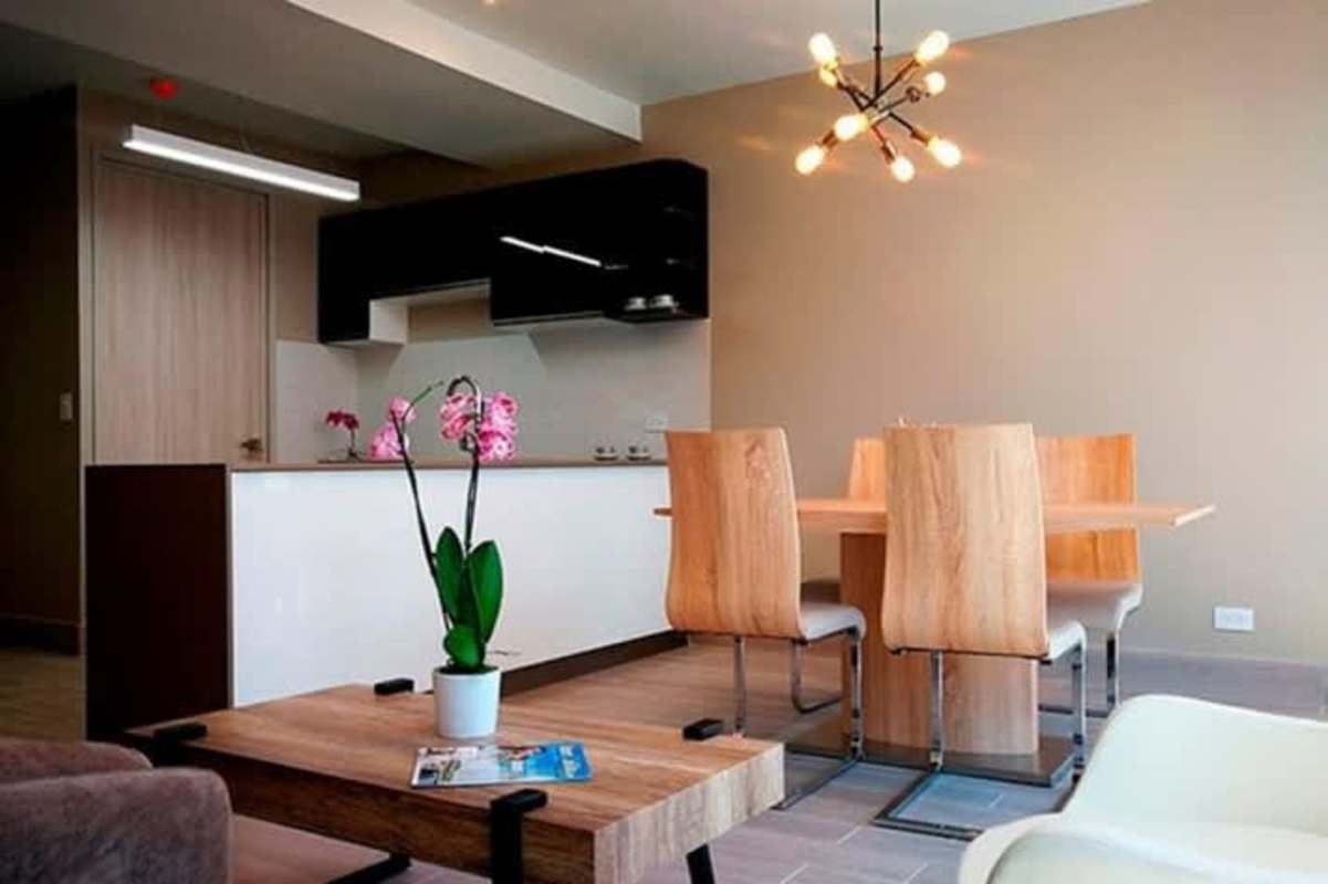 Spacious master bedroom with panoramic windows at PH Azurre Bella Vista Panama City.