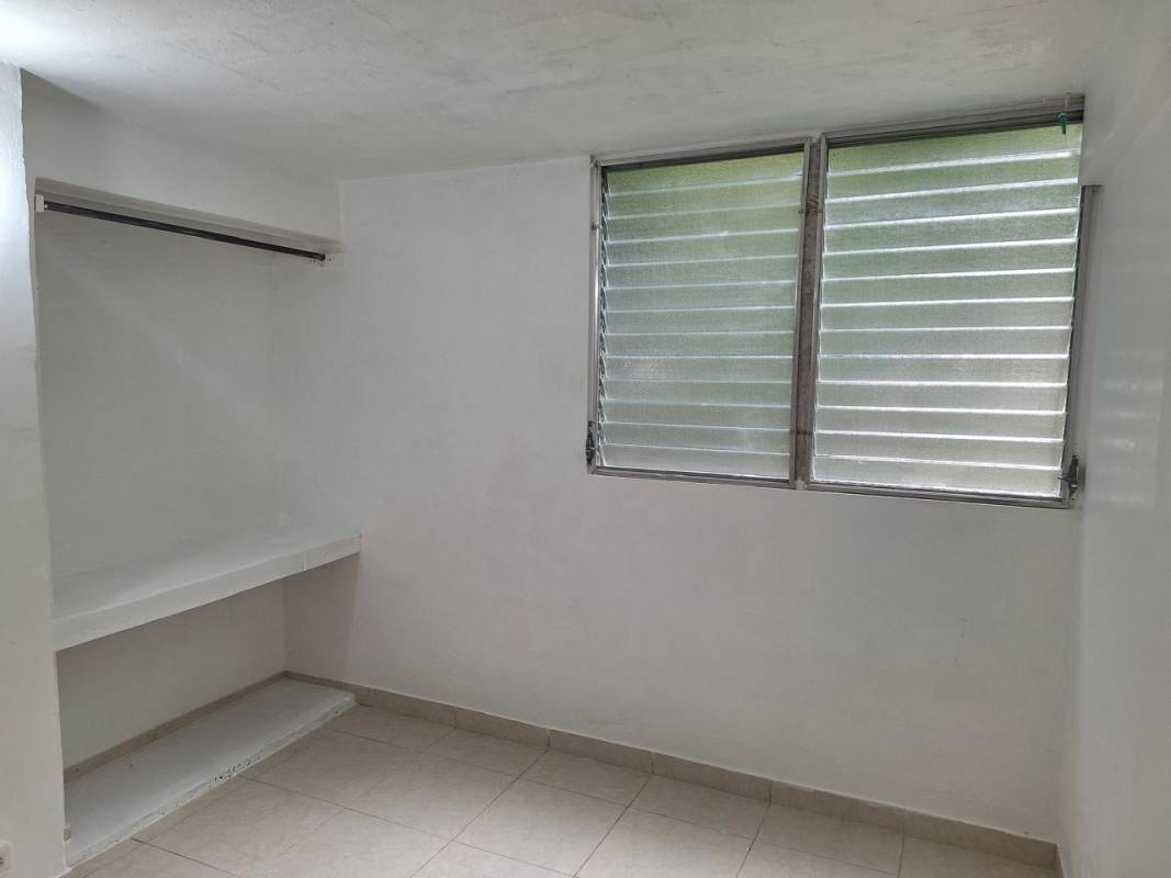 Laundry space with wash basin tiled wall PH Santa María apartment Betania Panama