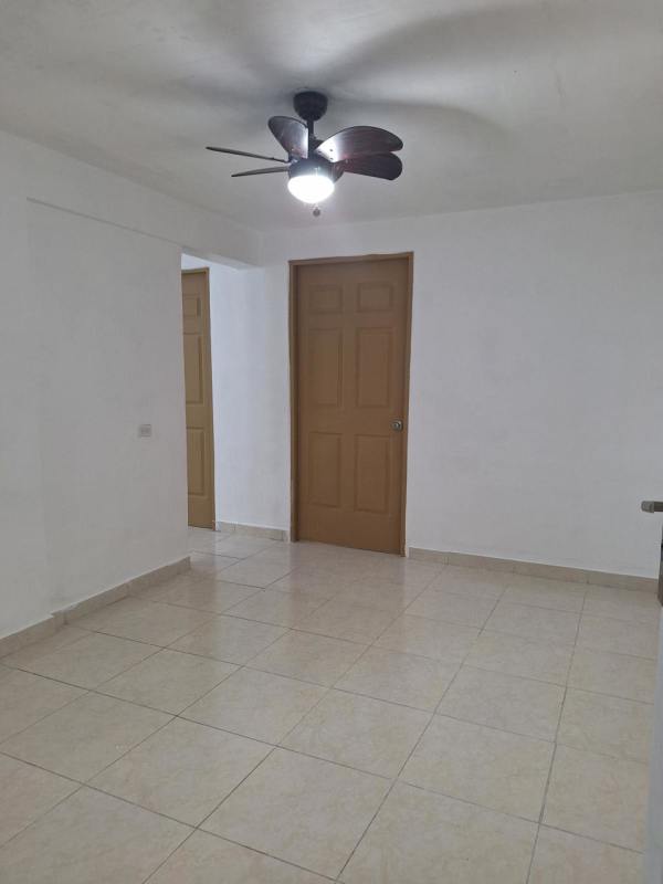 Spacious bedroom with natural light window tiled floor PH Santa María Tumba Muerto Panama