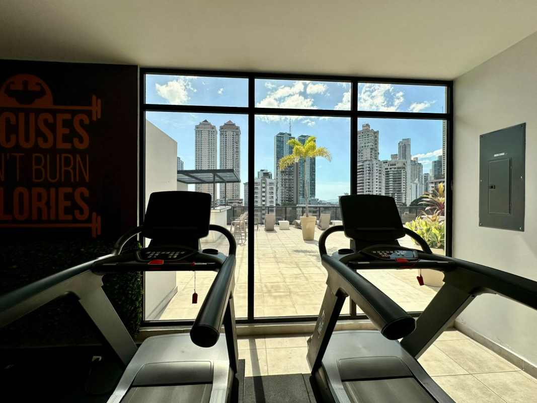Contemporary bathroom with marble tile, walk-in rain shower at PH Calle 50 Tower Panama City