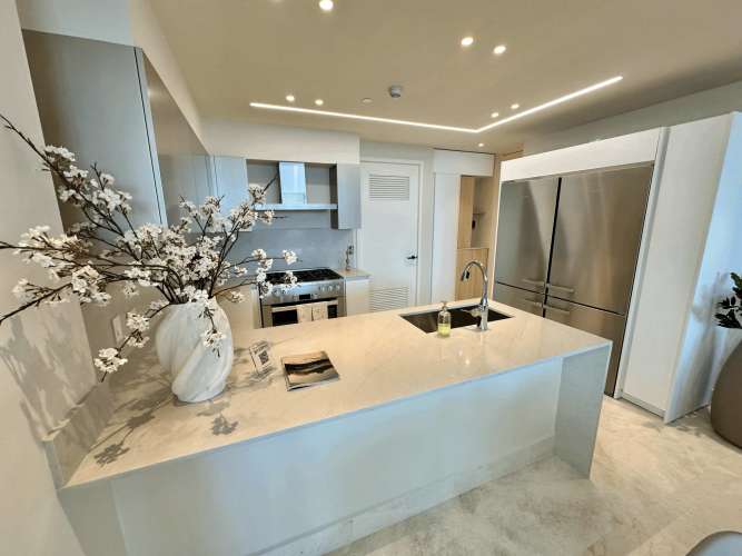 Kitchen with granite countertops, stainless appliances in luxury PH Ocean Club Punta Pacifica Panama