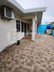 Fenced garden and swimming pool at Villa Mila Residencial Las Tablas Panama