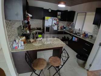 Modern kitchen with granite countertops and breakfast bar Villa Mila Las Tablas Panama