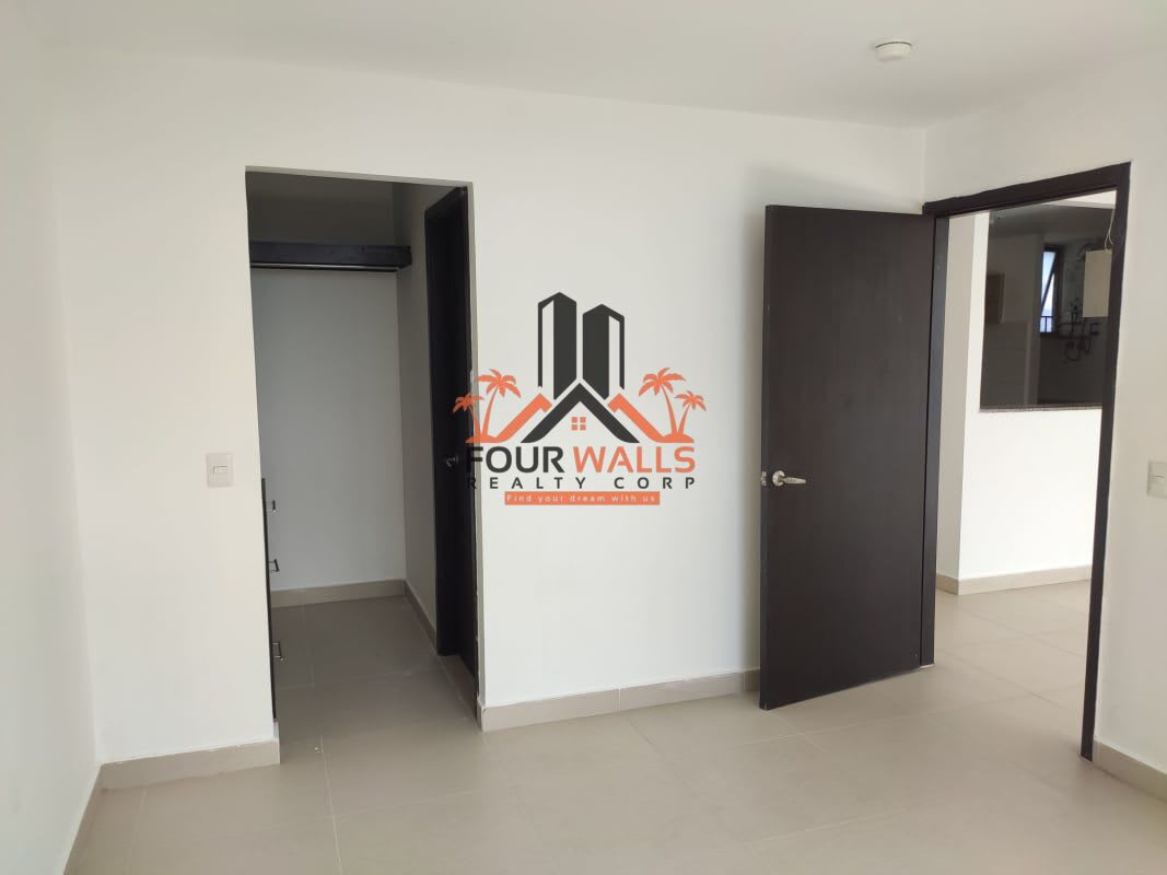 Bathroom with glass shower enclosure and granite countertop vanity at PH Alta Terra San Miguelito Panama