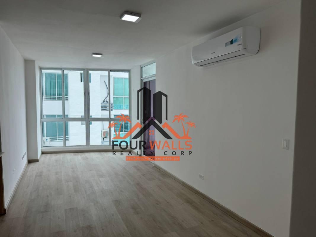 Contemporary kitchen with marble countertops, wood cabinets, and gas stove PH Cosmopolitan Tower Panama