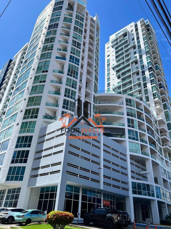 Contemporary high-rise building PH Cosmopolitan with glass balconies in San Francisco Panama