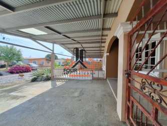 Covered carport metal roofing garden gate Urbanización El Mirador Panama