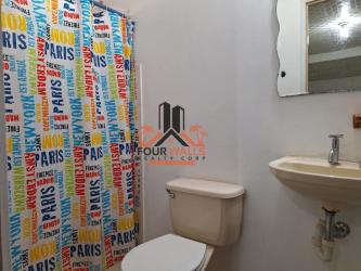 Bathroom with shower, sink and colorful curtain Urbanización El Mirador Antón Panama