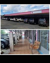 Warehouse spaces and parking lot at Aguadulce Shopping Plaza commercial retail area Panama