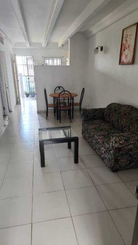 Children play structures, slide and grass area at residential complex Los Libertadores Panama