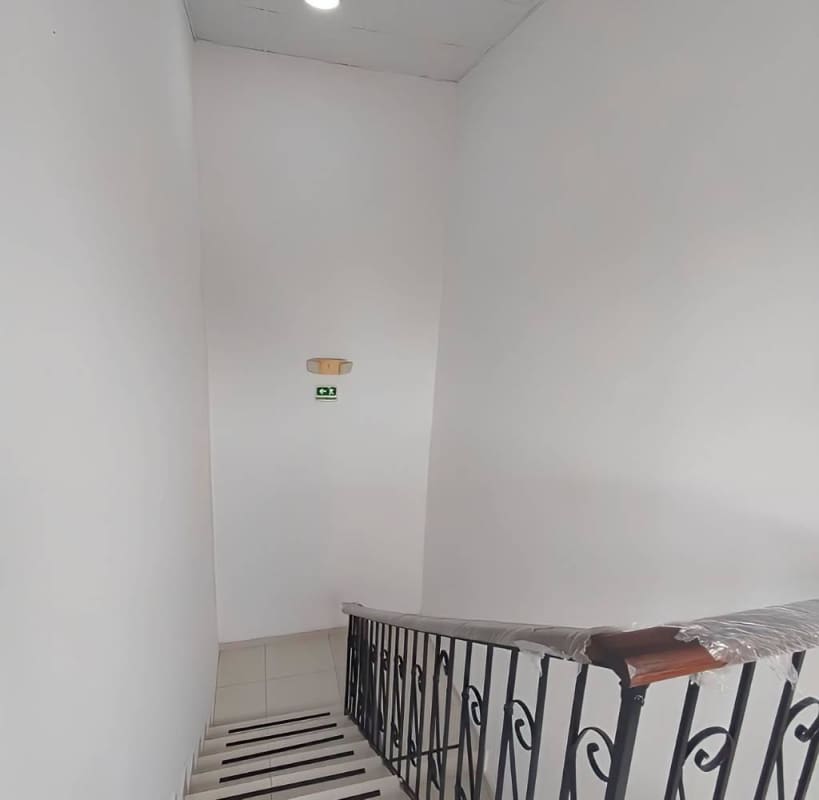 Internal empty white room with windows tiled flooring inside Parque Lefevre commercial plaza Panama