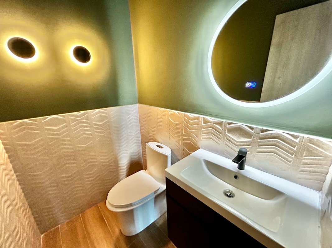 Conference room with large windows showing ocean skyline at BICSA Tower Costa del Este