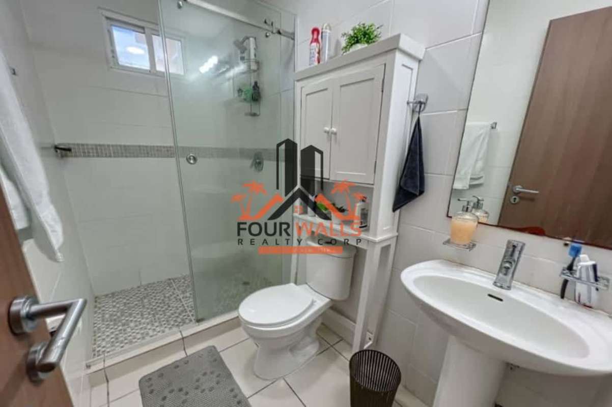 Bedroom with closet space, window and balcony access PH Villa Lucrecia Panama City