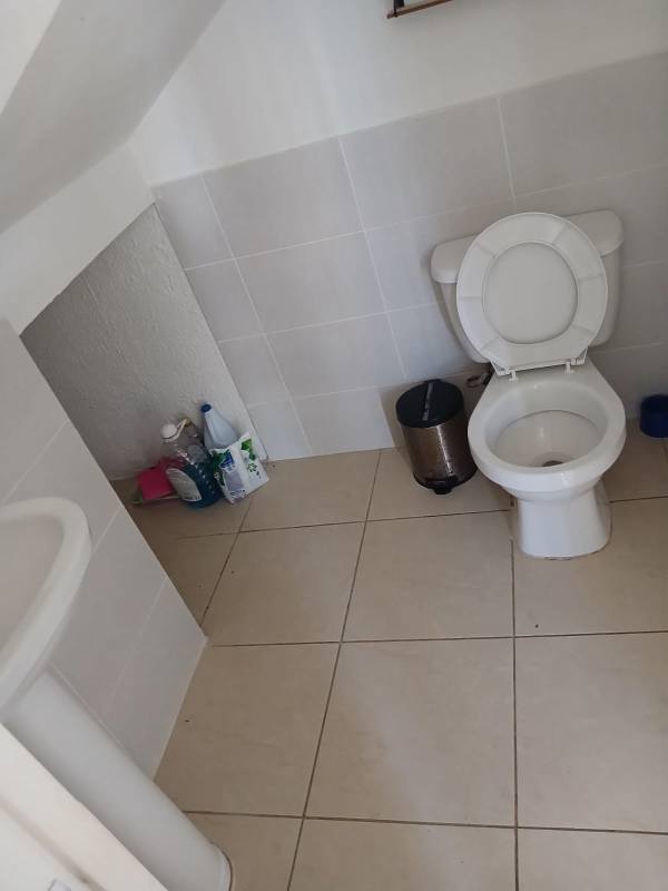 Compact powder room half bath tile floor Pacora townhouse Panama