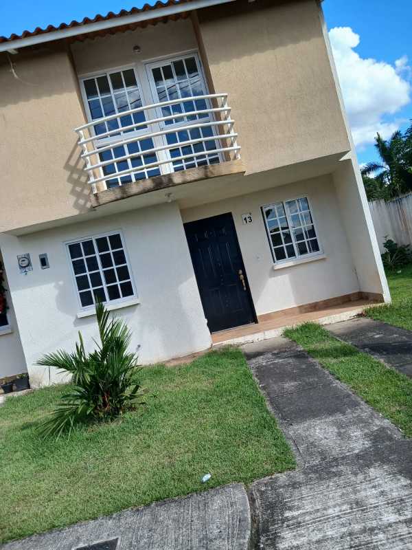 Outdoor laundry patio area with sink covered roof townhouse Ciudad Santa Fe Pacora