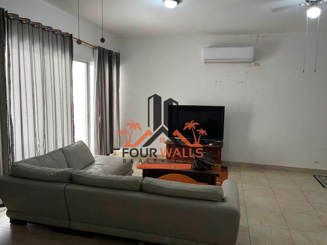 Bathroom with glass walk-in shower, stone tiles, single vanity in PH Amador Hill Amador Panama