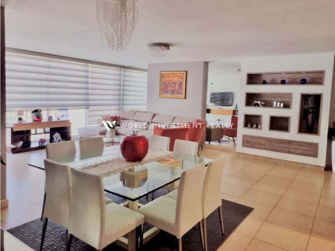 Open-plan living dining with natural light glass table PH Costa View Costa del Este Panama