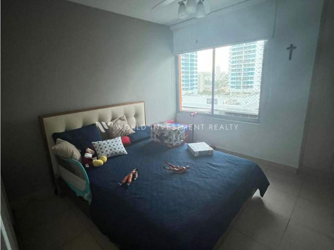 Bedroom with city view large window and neutral decor in PH Costa View Costa del Este Panama