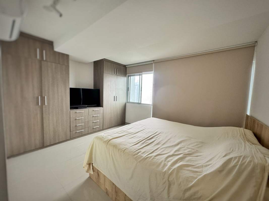 Stylish kitchen with granite countertops, stove, dishwasher in PH Parque 22 Carrasquilla