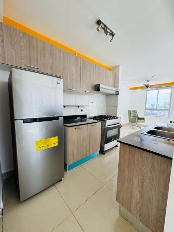 Bedroom with closet, AC, fan, and large window PH Coral Tower Panama City