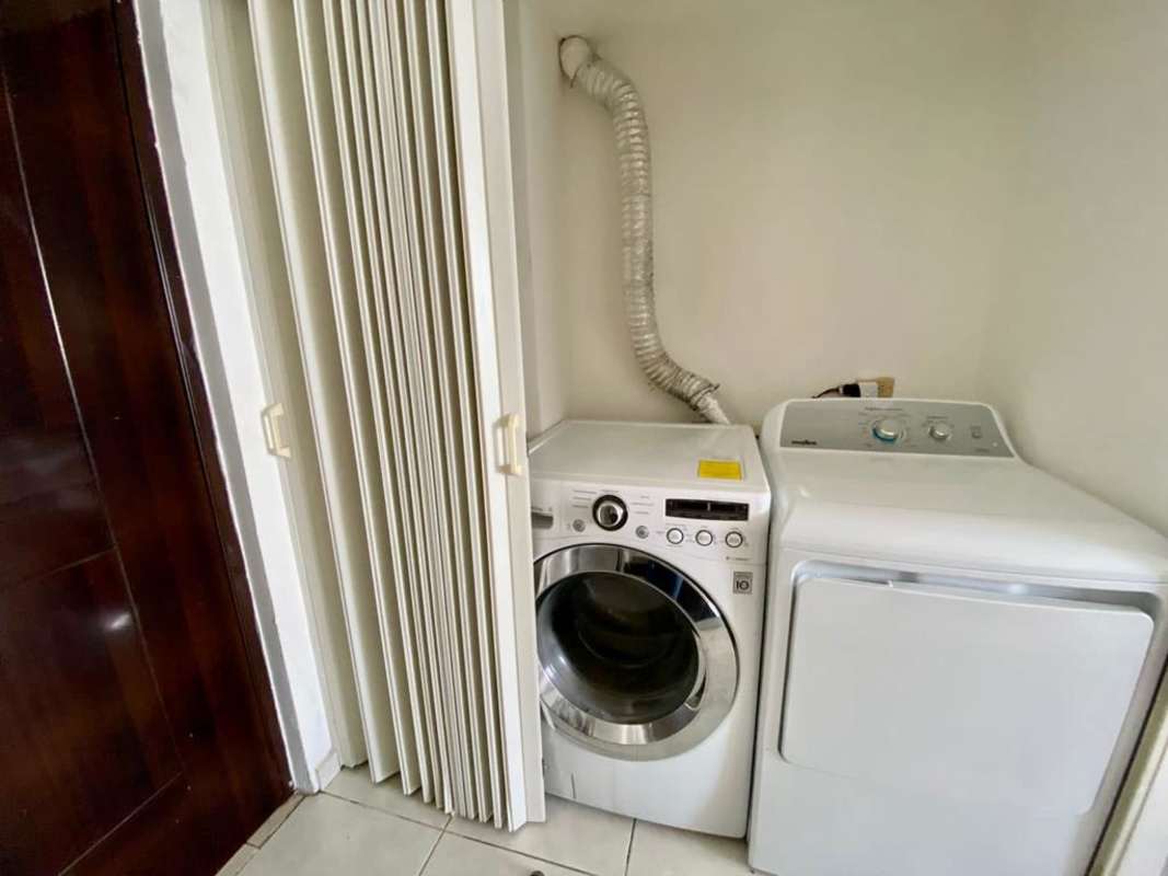 Dining space with large window ocean backdrop in PH BICSA Avenida Balboa Panama