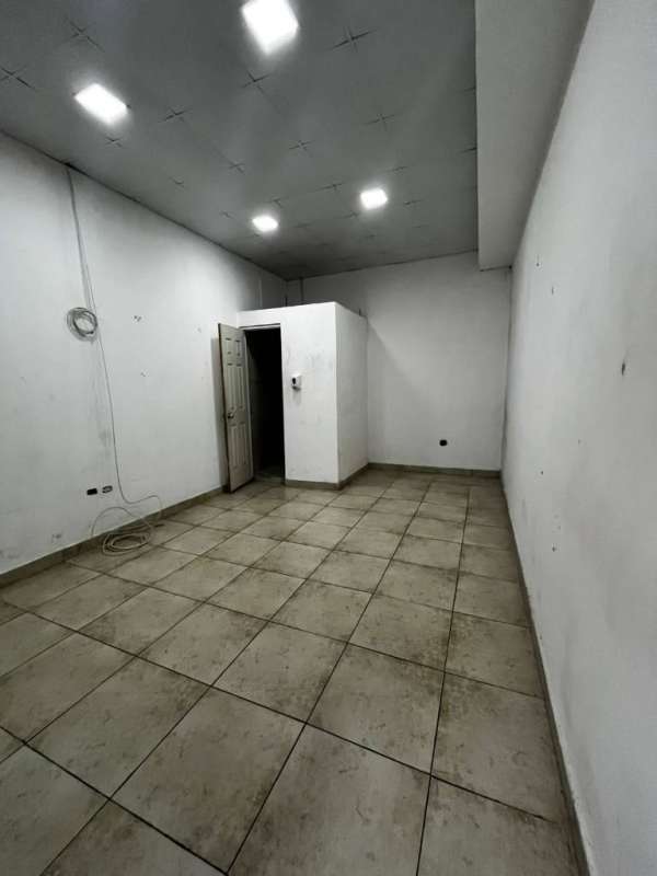 Spacious commercial interior with red accent wall suitable for showroom or office in Panama