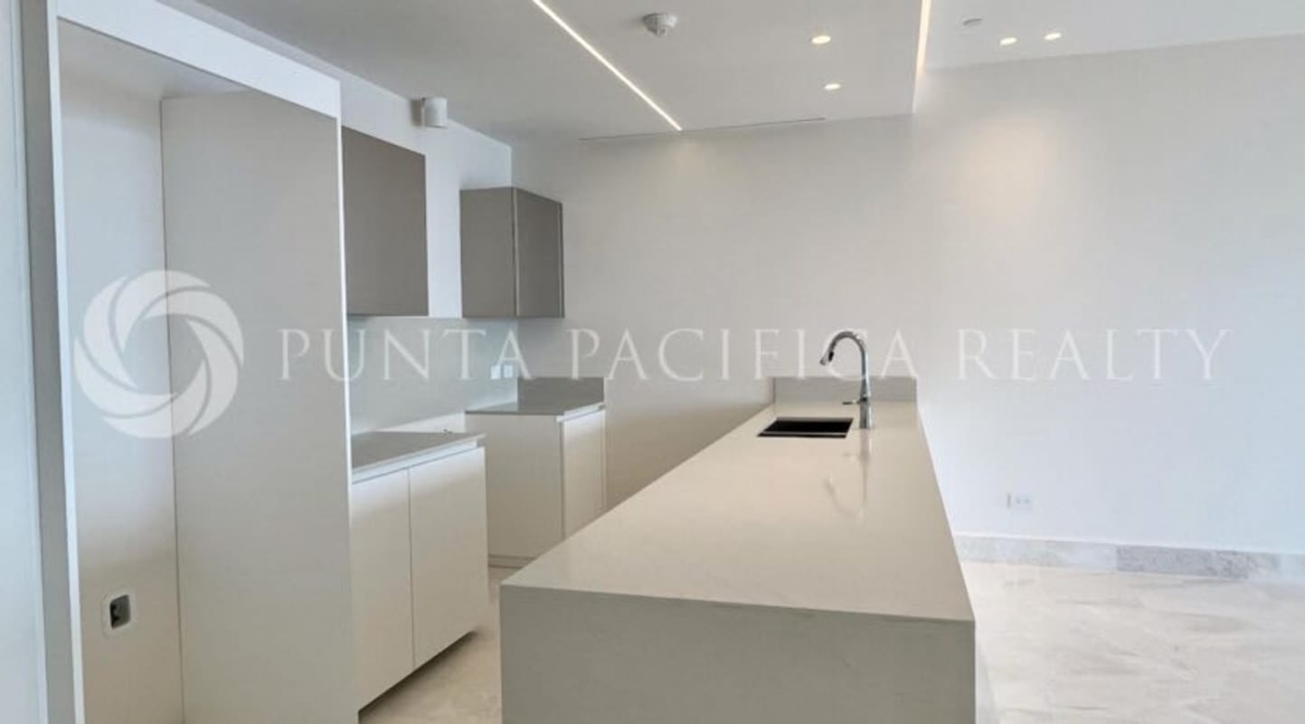 Large living dining space with floor-to-ceiling oceanfront windows PH Seascape Punta Pacifica Panama