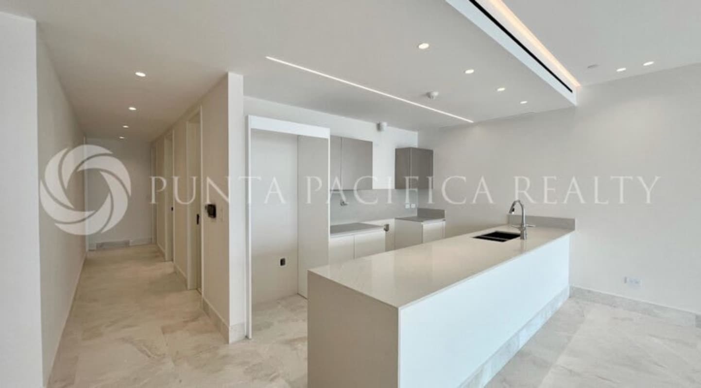 Primary bedroom with floor-to-ceiling windows and ocean views in PH Seascape Ocean Reef Panama City