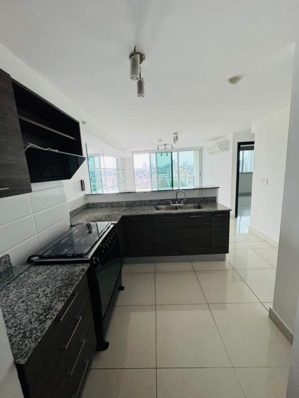 Spacious bedroom with tiled flooring, closet and large windows in PH Midpark Panama City