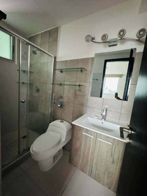 Contemporary bathroom with glass shower and vanity in PH Midpark Carrasquilla Panama