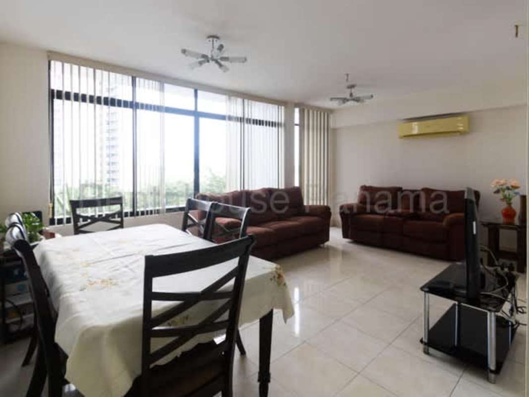 Closed kitchen with white cabinets, modern appliances in PH Pacific Hills Panama