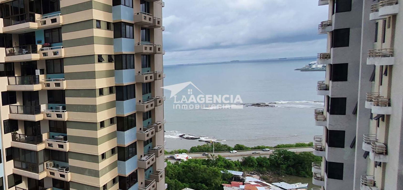 Modern high-rise facade with glass balconies at PH San Francisco Bay Panama