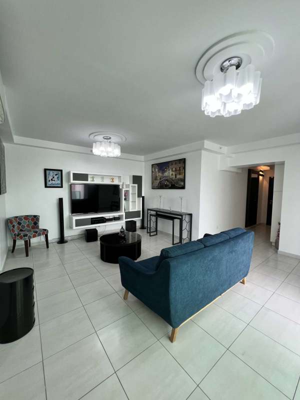 Second bedroom with built-in closet large window and city view PH Vista Hermosa Tower Panama