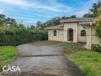 Bright living room with porcelain tiles and large windows Lucero Country Club
