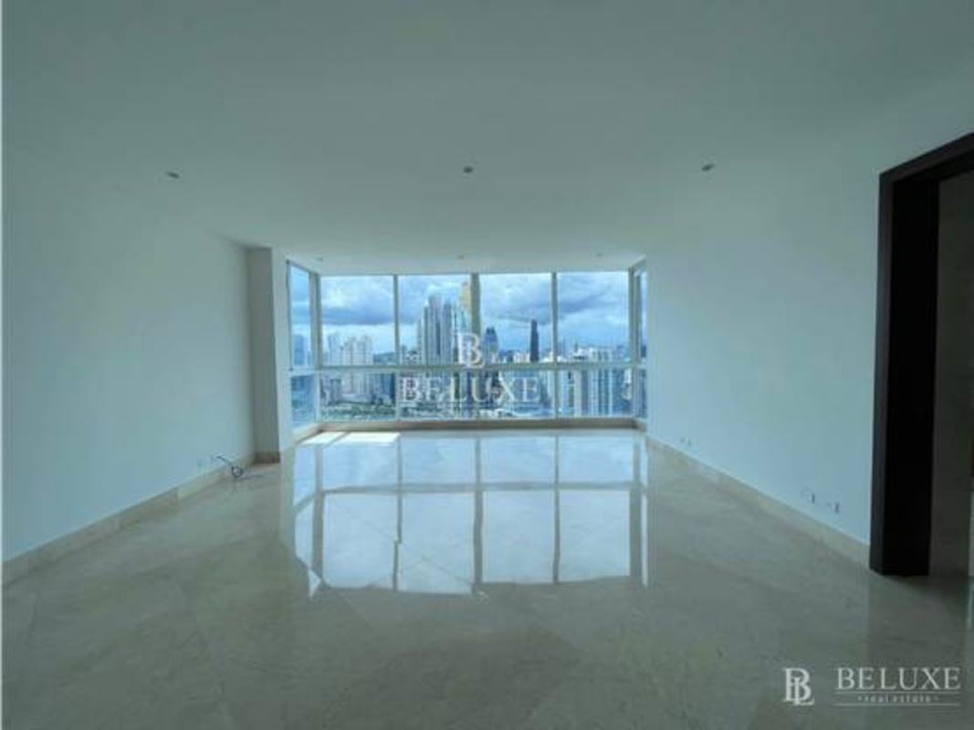 Spacious kitchen with wood cabinetry and granite countertops Punta Paitilla PH The Point