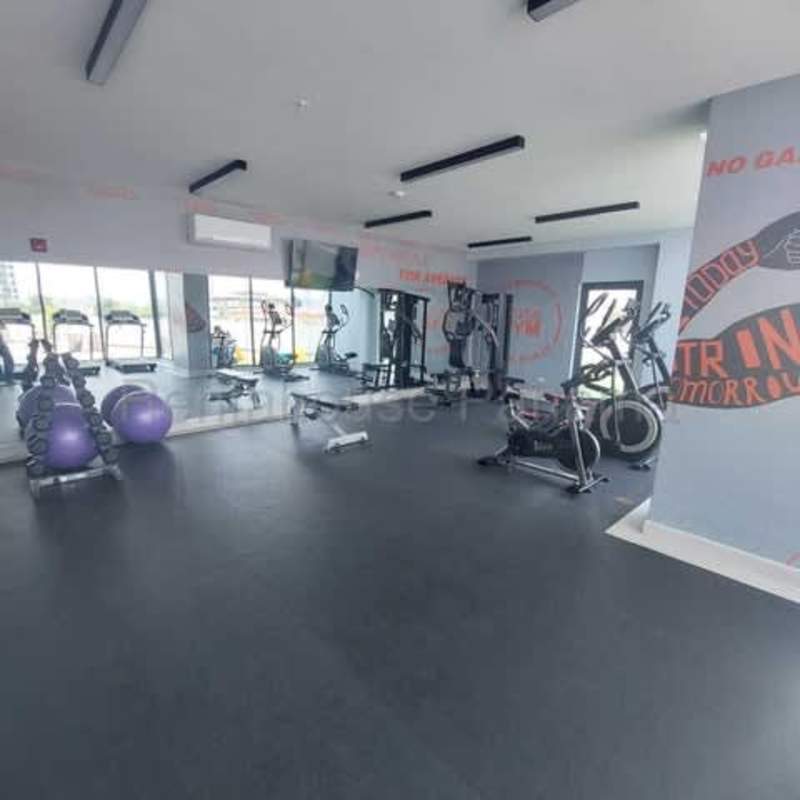 Apartment gym with large windows cardio machines Parque Lefevre Panama rental