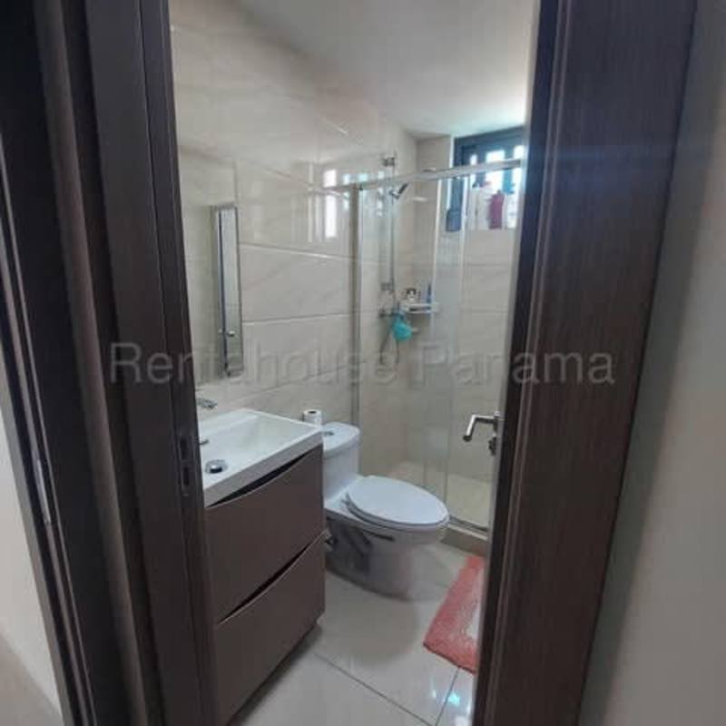 Minimalist bedroom with large window split AC tile floor Parque Lefevre Panama