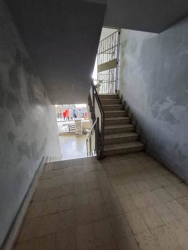 Spacious living room with window, under renovation, light walls, Via España Obarrio