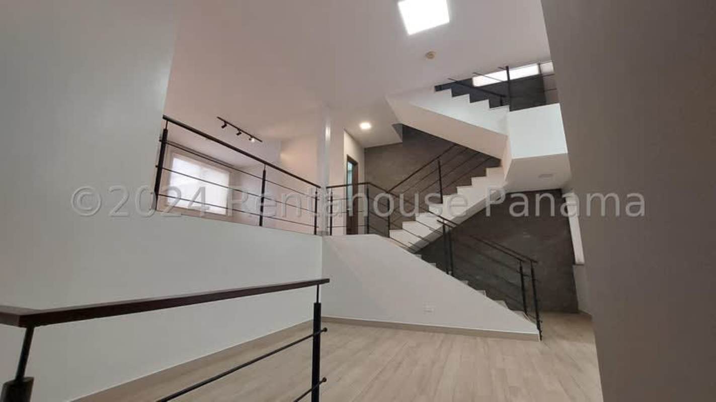 Bright living area with high ceiling, large windows, open design house in San Francisco Panama