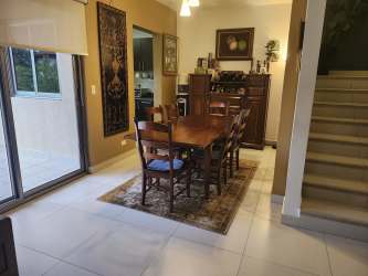 Bright master bedroom with garden view ensuite in Panama Pacifico Woodlands townhouse
