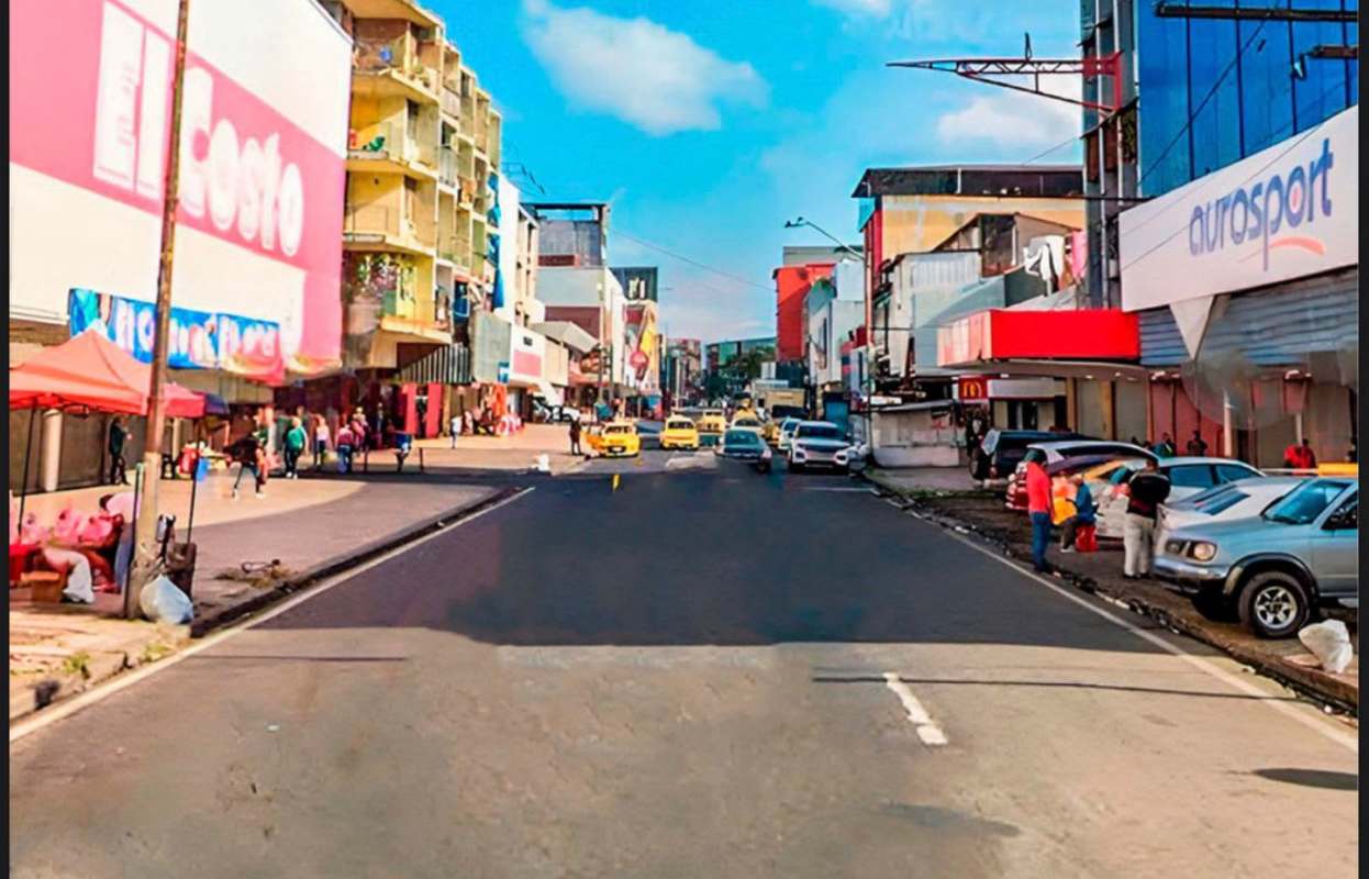 Calidonia Panama busy commercial street with shops and cars vibrant retail area