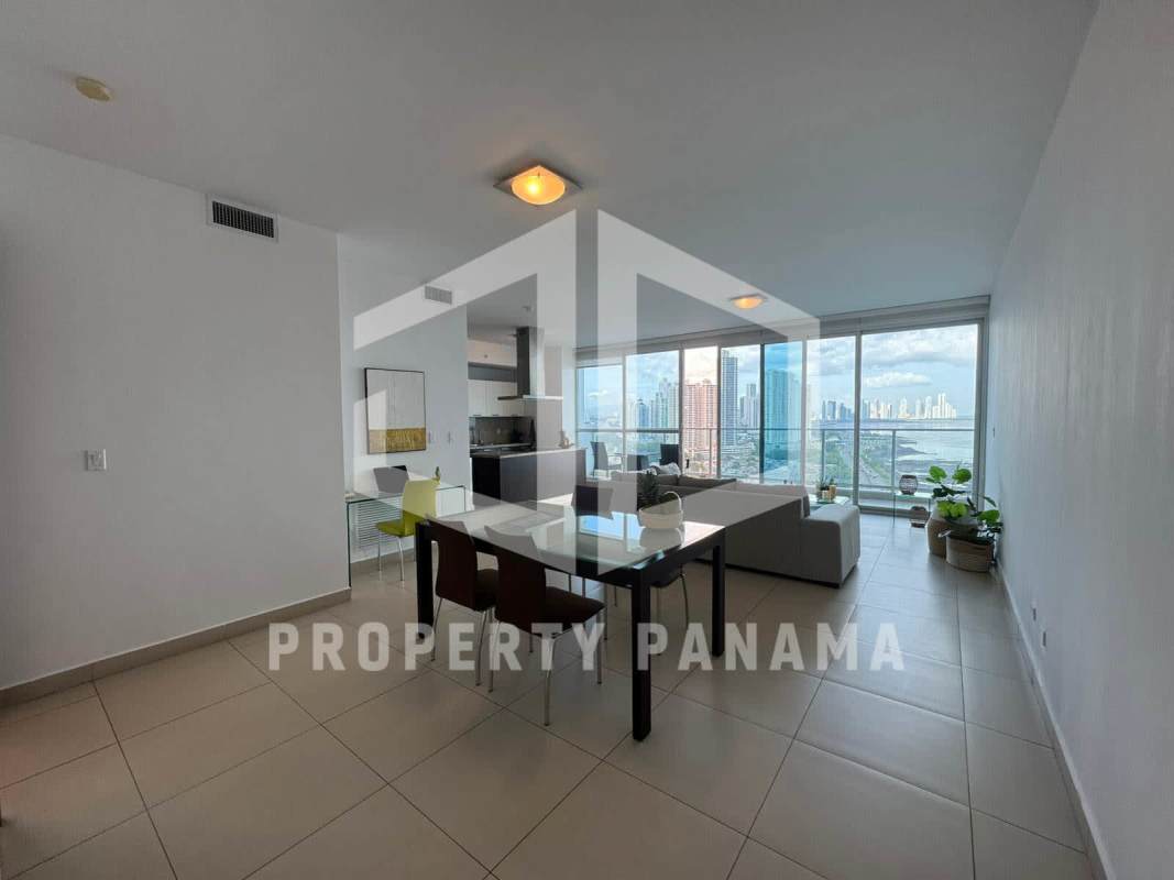 Modern dining space with large windows offering ocean views in PH Oceanaire Punta Pacifica